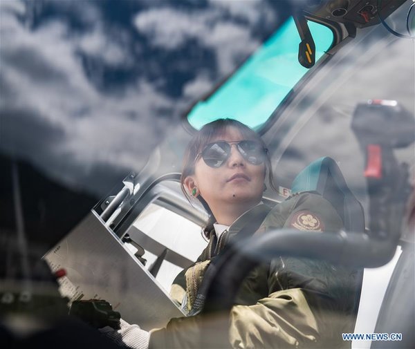 Female Pilot from Impoverished Family Flies Helicopter in China's Tibet